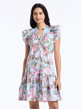 Woman wearing a floral dress on a white background