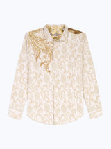 White shirt with gold embroidery on a white background