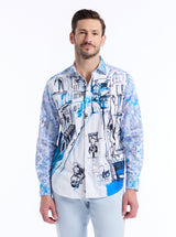 Man wearing a patterned shirt with blue and black city road designs on a white background