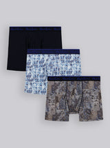 Three pairs of men's boxer briefs in black, patterned, and abstract designs on a light gray background.